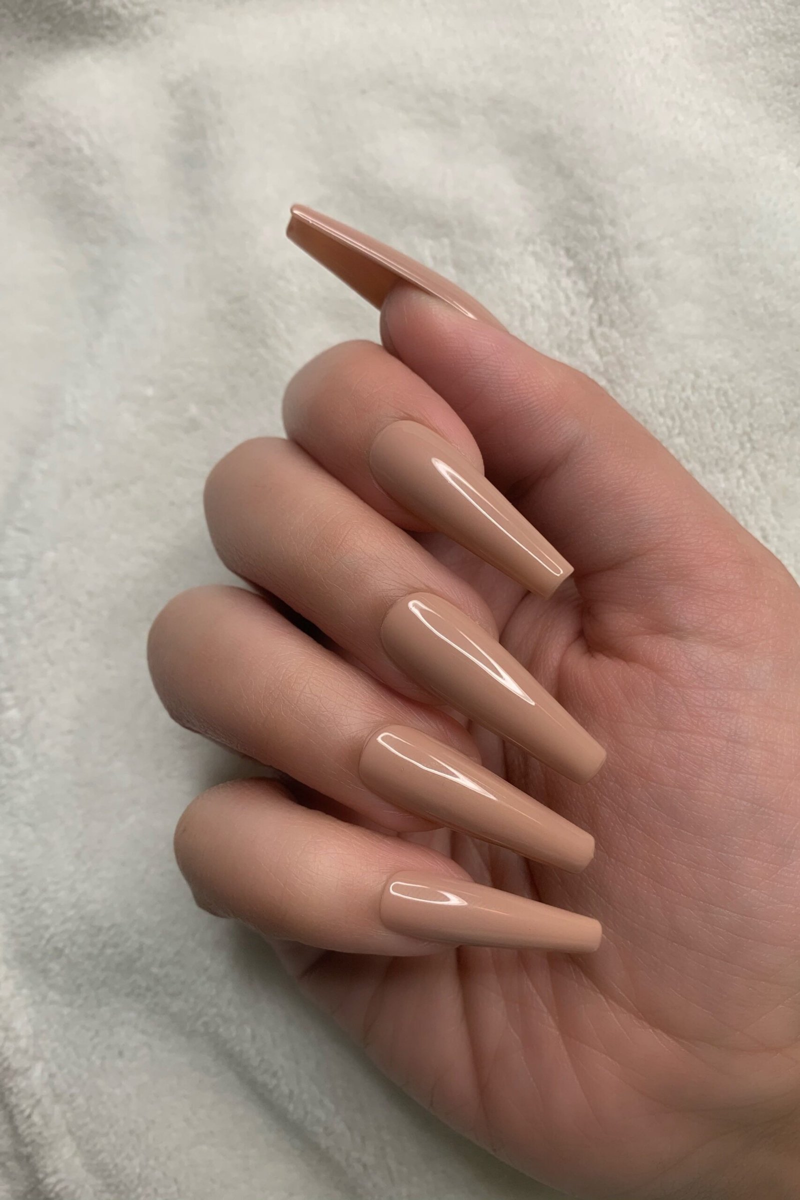 Classic Beige Stiletto Nails - nude nail art idea for women over 40