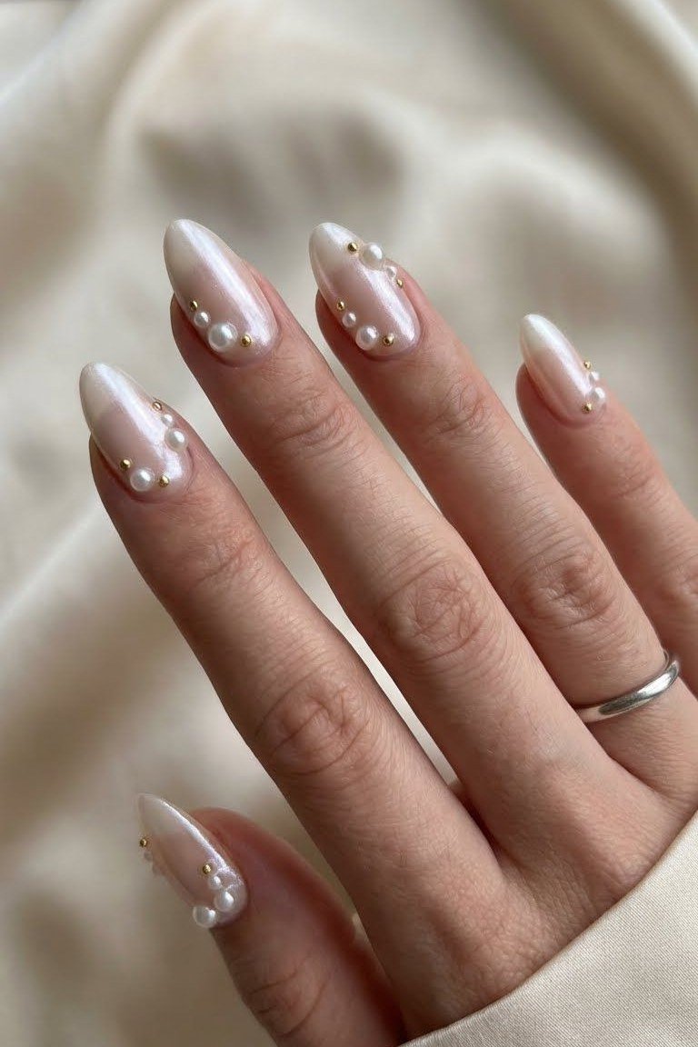 Milky Pearl Almond Nails - pearl finish nail idea for women over 60