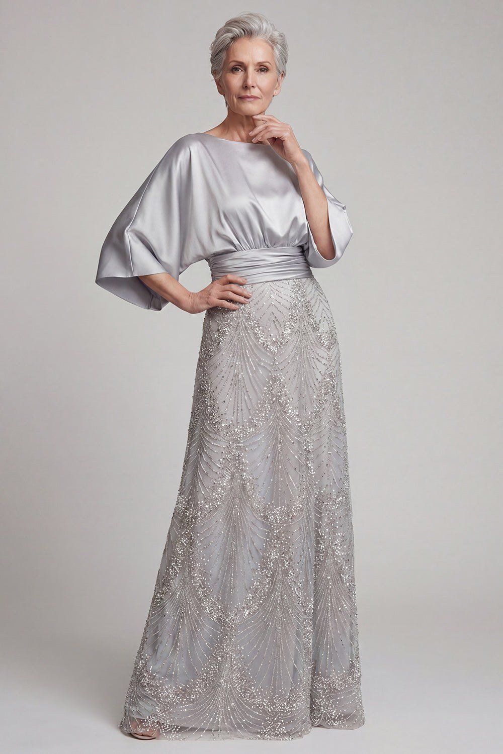 silver metallic lace gown with cape sleeves