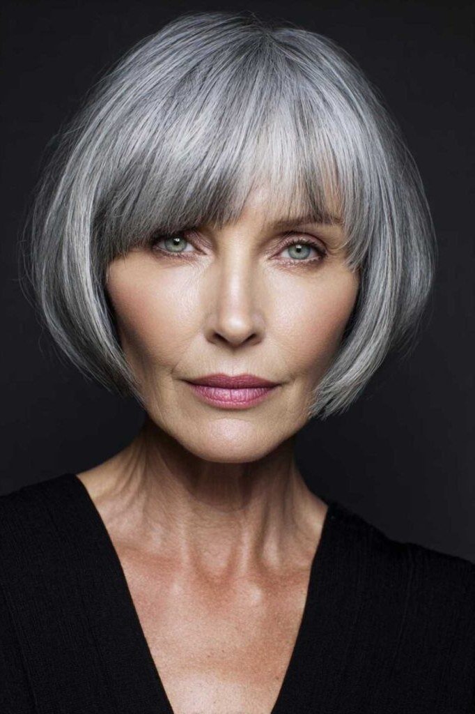 Sleek silver-grey french bob with full bangs