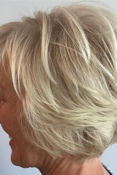 Silver layered bob, side view, feathered texture - wispy hairstyle for women over 40