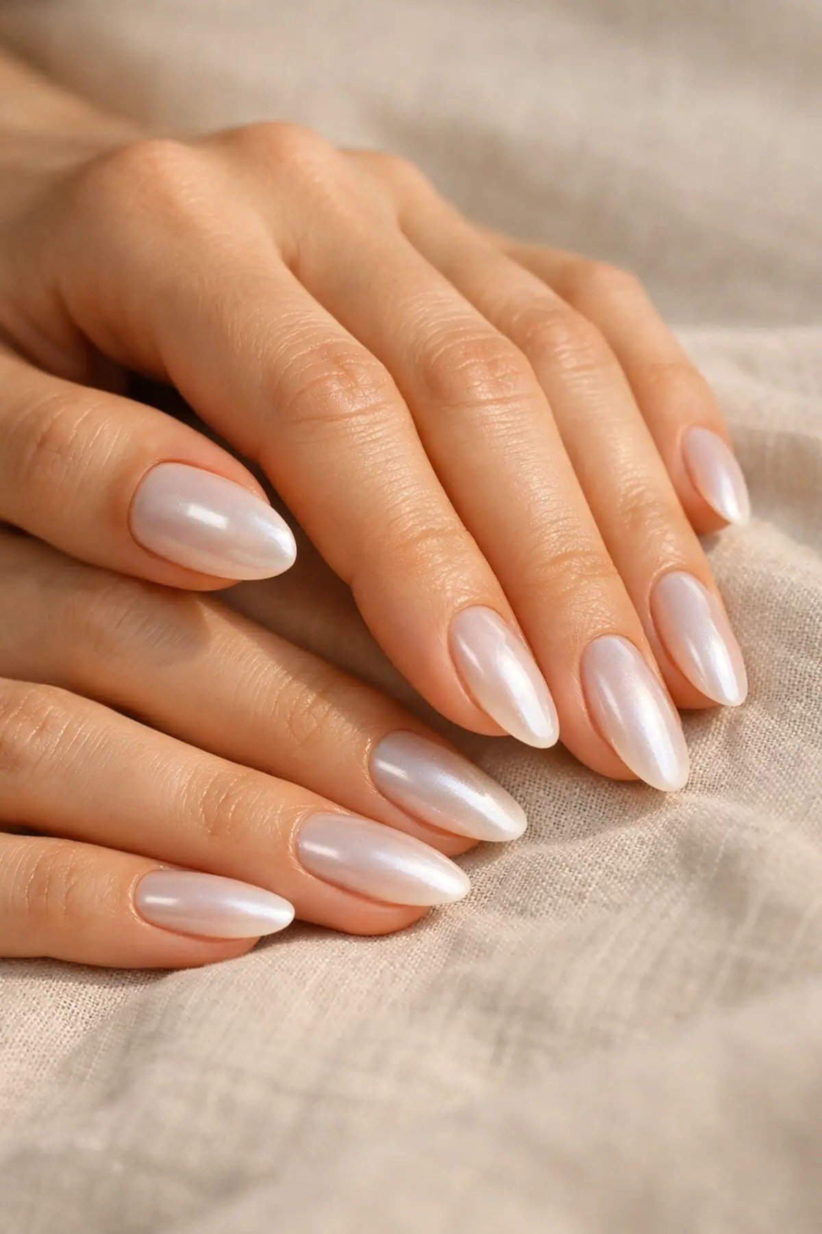 sheer milky pink almond gel nails, soft pink nail idea for women over 50