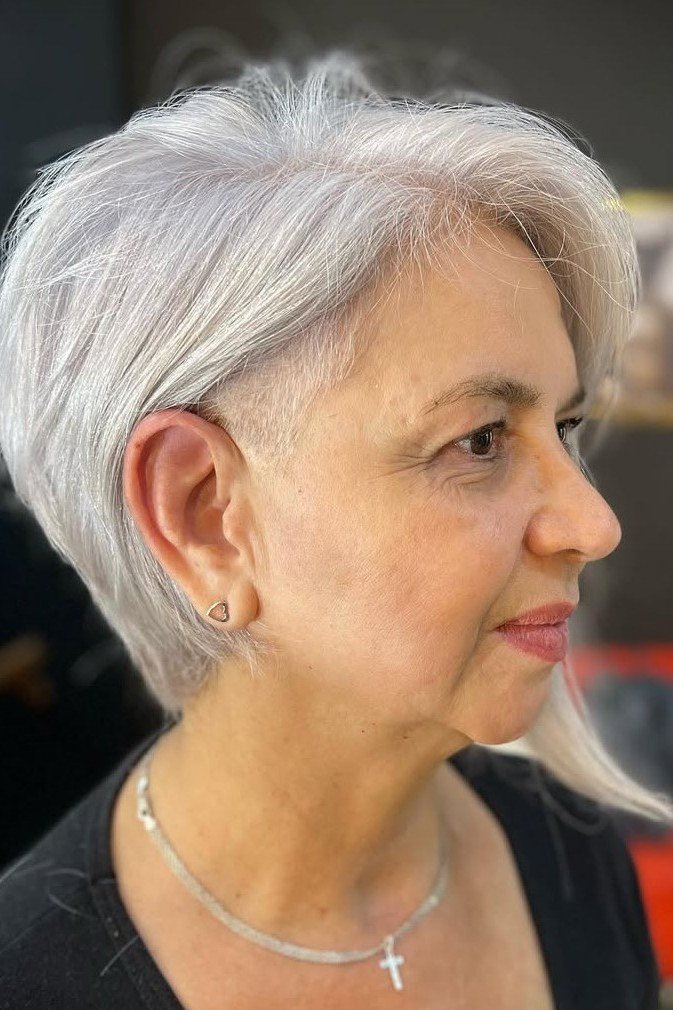 Classic White Pixie with Side Sweep hairstyle for women over 60
