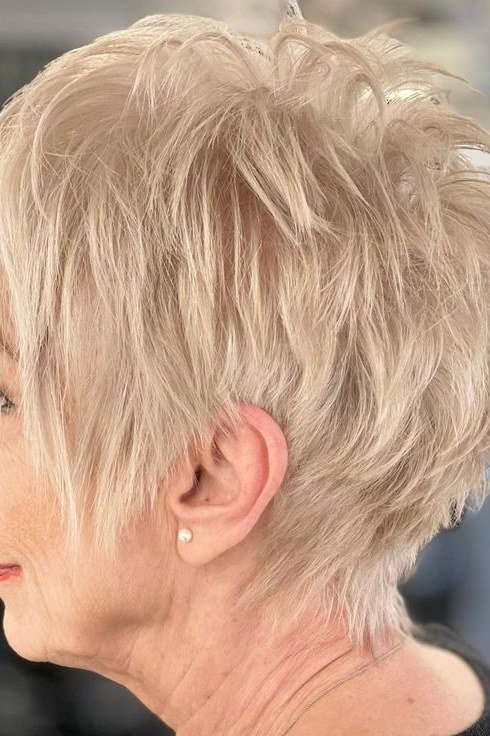Textured blonde pixie haircut for women over 50