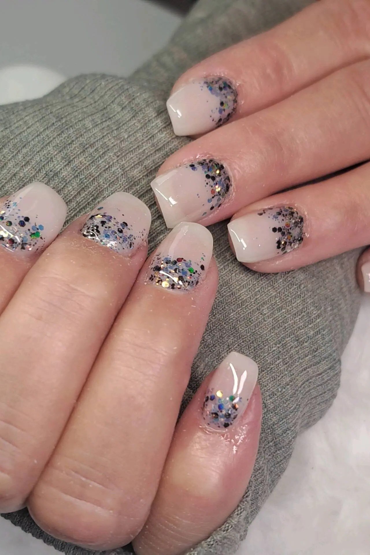 Confetti Glitter on Milky White nail design for women over 40