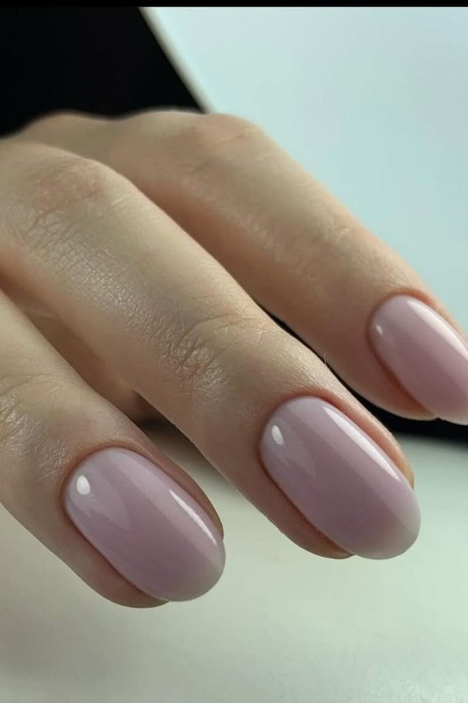 Dusty mauve oval matte minimal, elegant fall nail design for women over 40