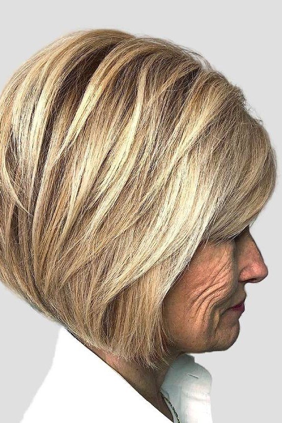 White tapered pixie haircut for women over 70, side view