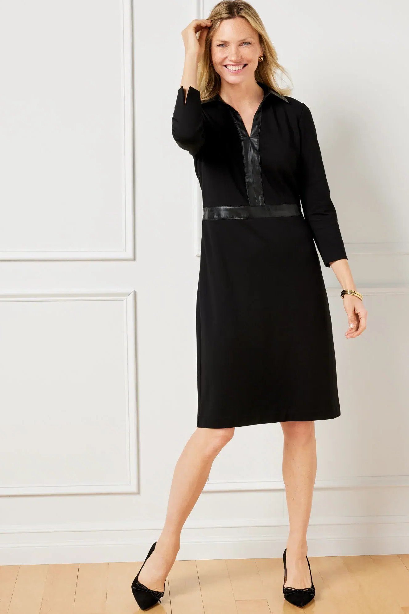 Black belted sheath dress for women over 50