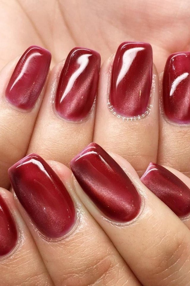 Glossy cherry red square, mature hands, burgundy fall nail idea for women over 60