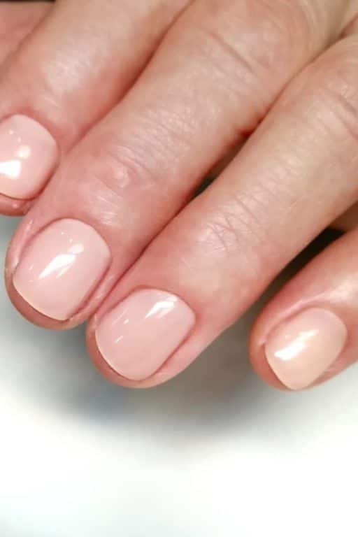 Peachy-Nude Short Oval Nails, nail color idea for women over 60