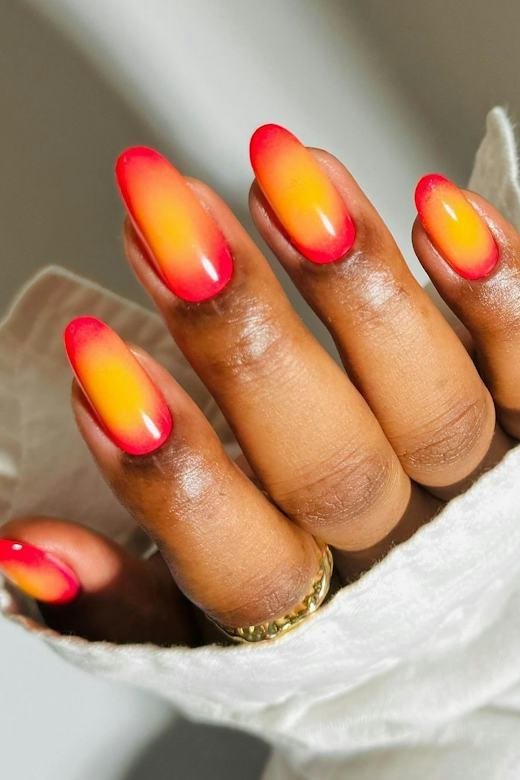 Sunset Flame Almond Nails - Golden yellow glows at the center of these almond nails, melting into hot orange and deep red at the edges.