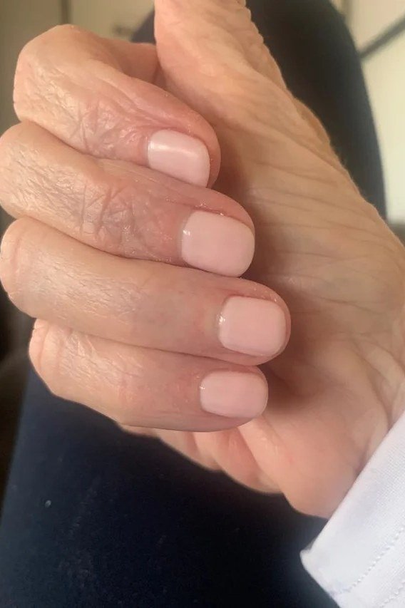 Natural nude short rounded nails for women over 50