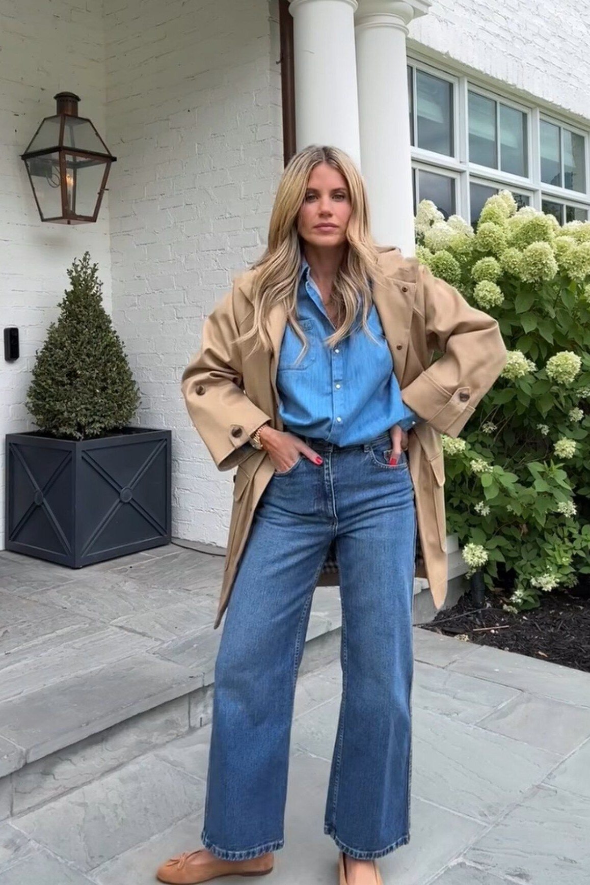 Camel Coat over a Blue Shirt and Wide-Leg Jeans - fall outfit idea for women over 50