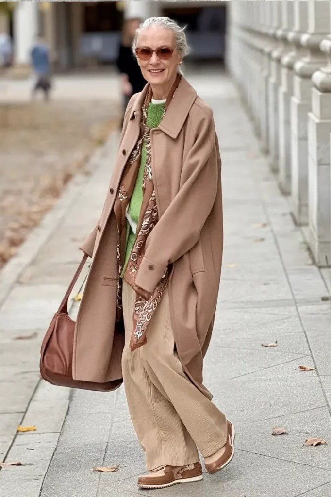 camel coat olive top tan trousers fall street style over 50