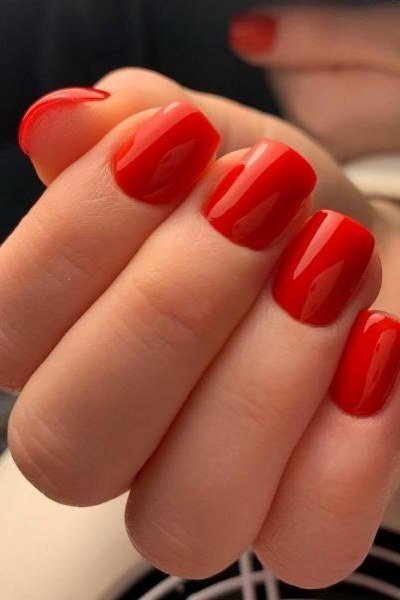 Bright Red Squoval Nails with a Gold Ring - old money fall nail color for women over 40