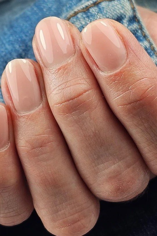 Beige Nude with Denim - short nude nail idea for women over 50