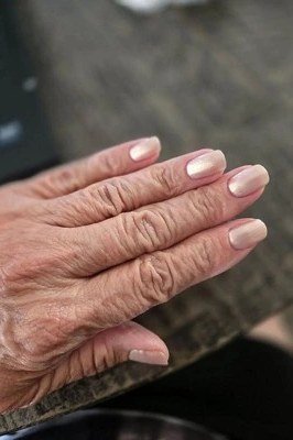 Barely there nude nails for very mature hands