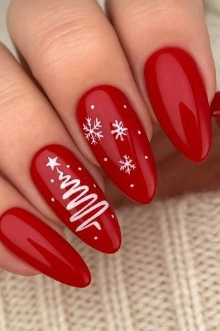 glossy red christmas nails with white snowflakes and tree art