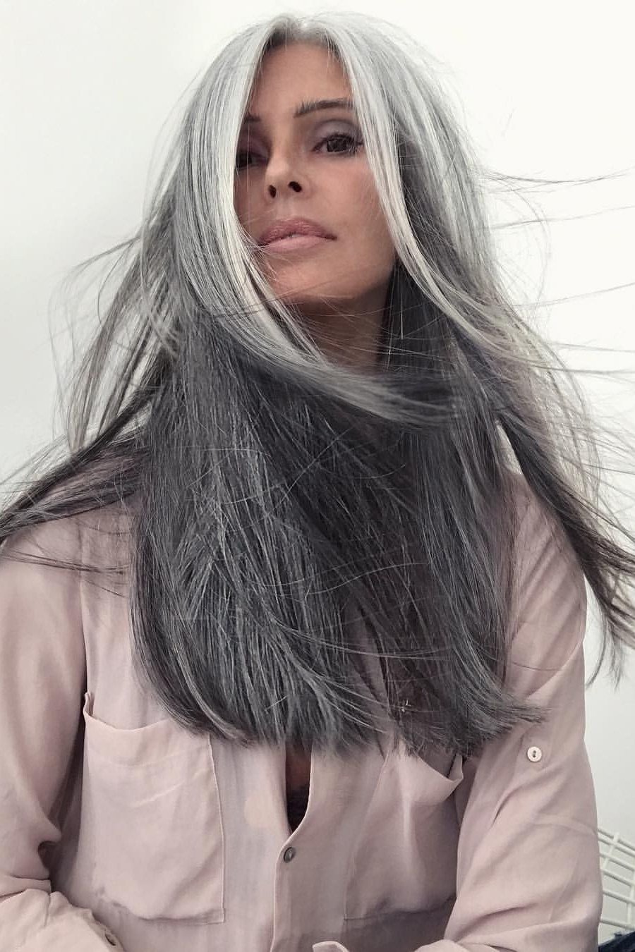 windswept long silver grey hair, front view