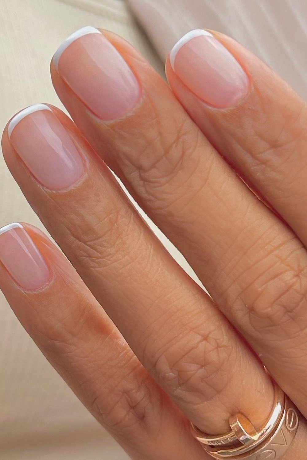 Ring-Styled Pink Minimalism - micro french manicure with ultra-thin tip line, elegant nail design for women over 50