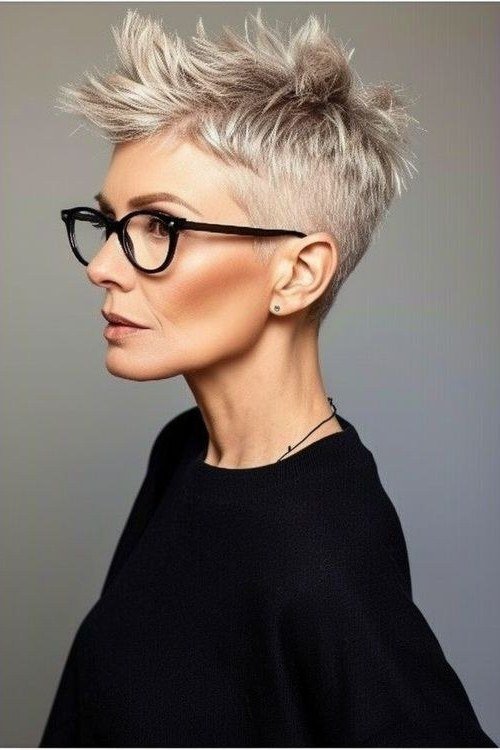 Spiky Pixie with Bold Black Glasses - bold edgy pixie haircut for women over 50