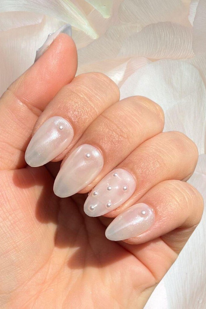 Short Milky Pearl Almond Nails - pearl finish nail idea for women over 60