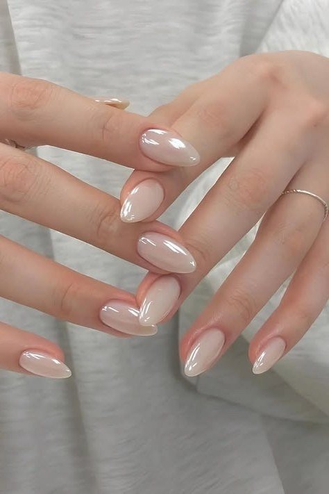Glossy Nude Almond Nails - flattering nail polish shade that hides veins for women over 50