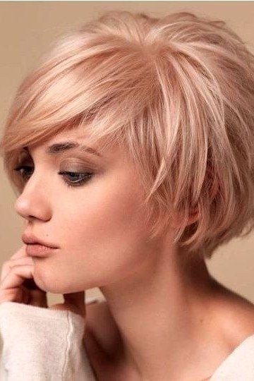 Pastel pink textured bob, front view - wispy hairstyle for women over 40