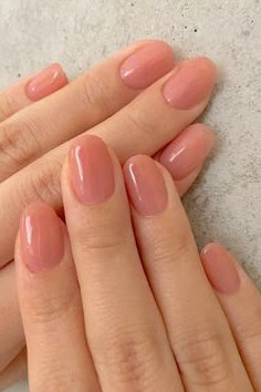 Glossy mauve short gel nails for mature hands