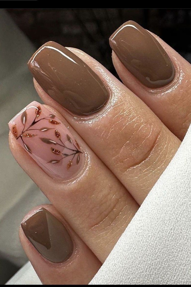 Chocolate oval glossy with floral accent nail, elegant fall nail design for women over 40