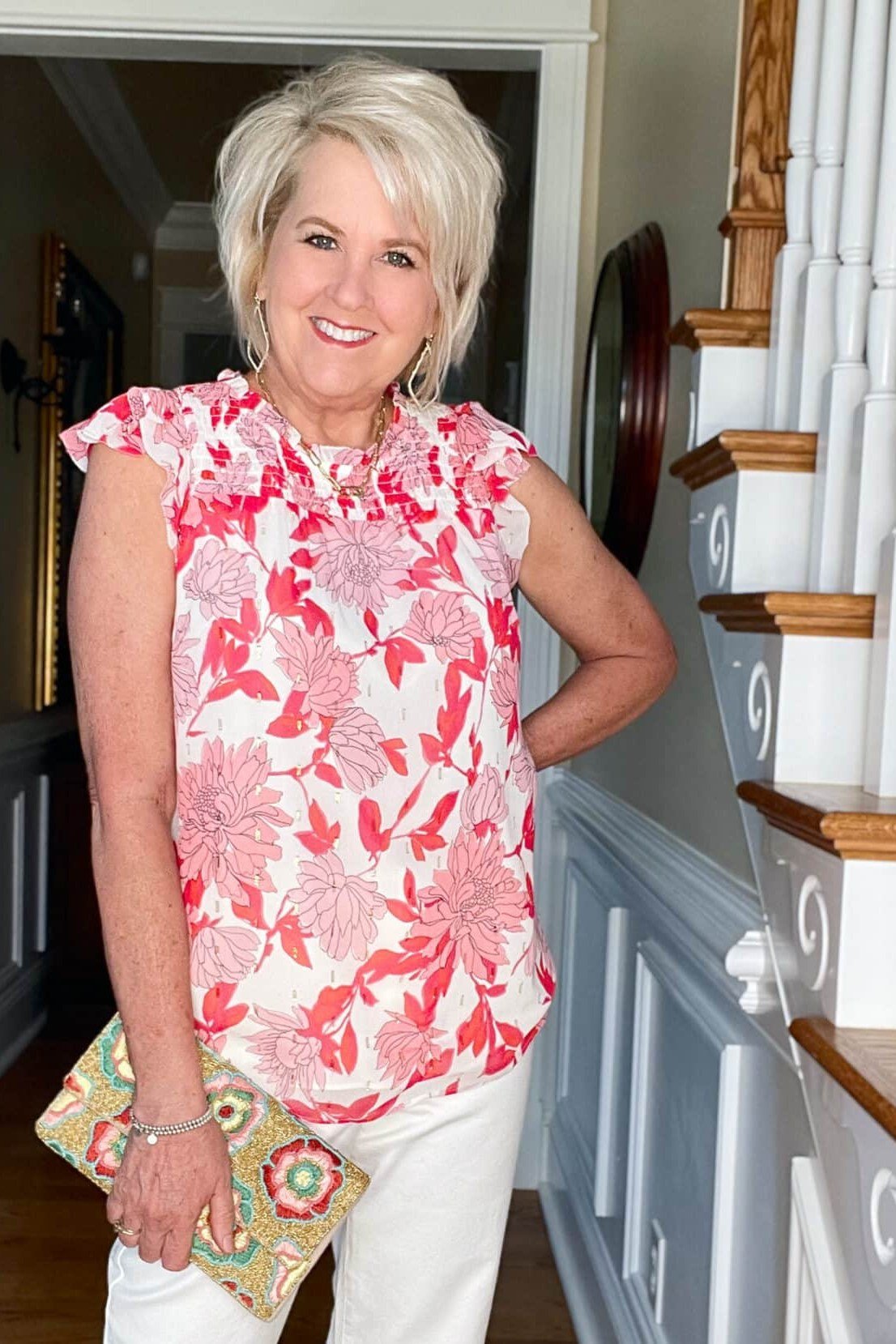 Pink Floral Sleeveless Blouse With White Trousers, smart casual outfit for women over 50