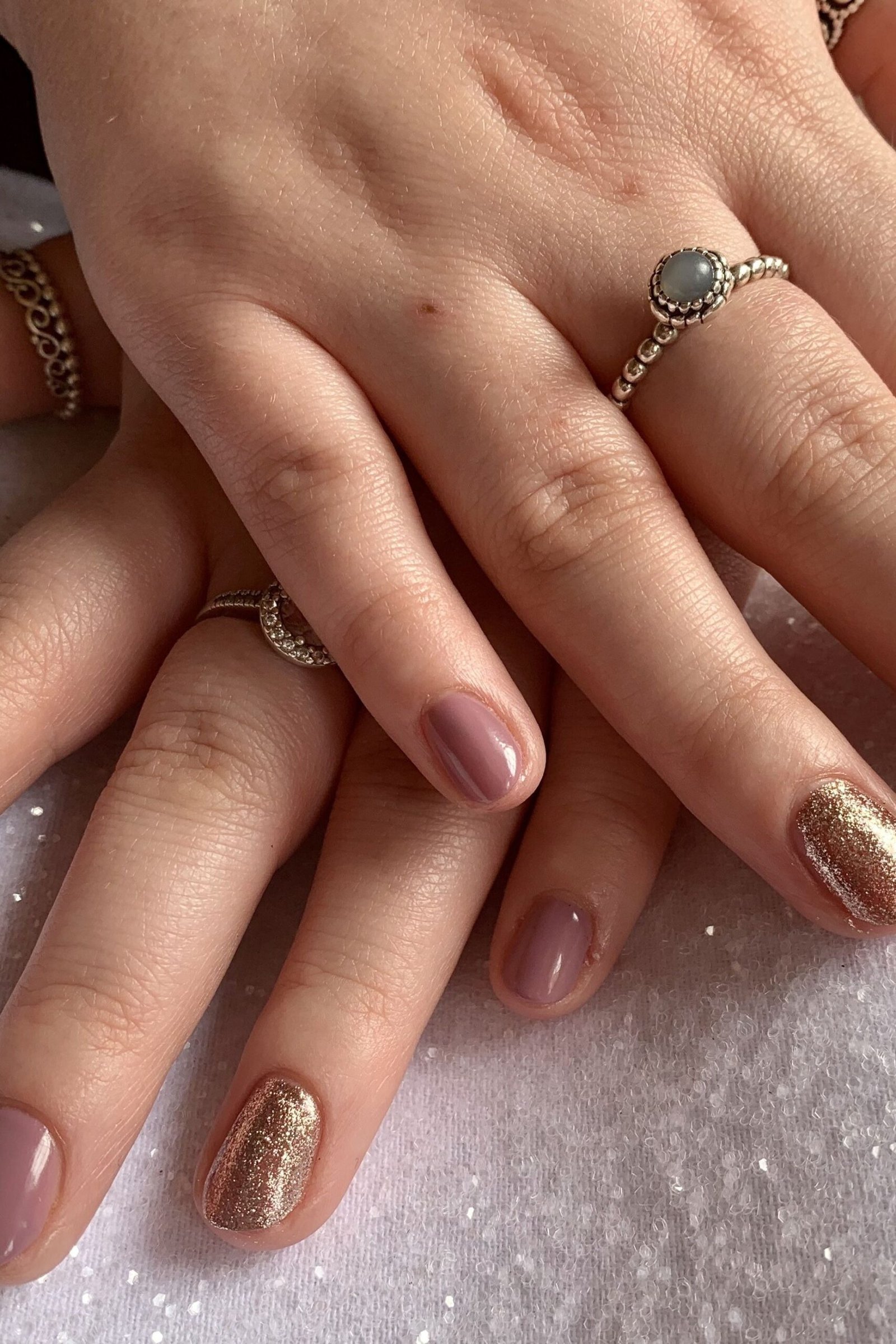 Taupe with a Gold Glitter Accent gel nails for women over 60