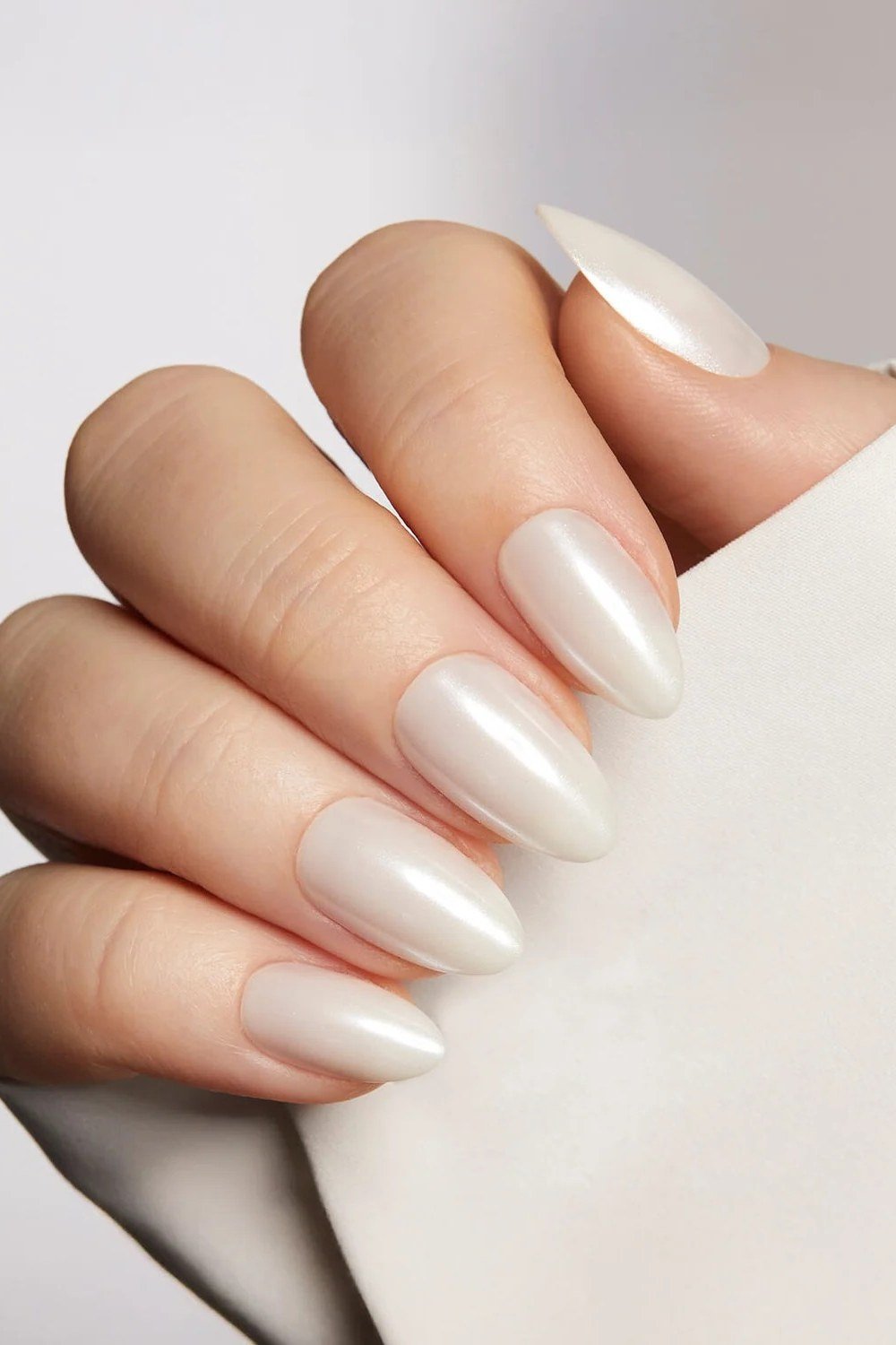 Classic White Pearl Almond Nails - pearl finish nail idea for women over 60