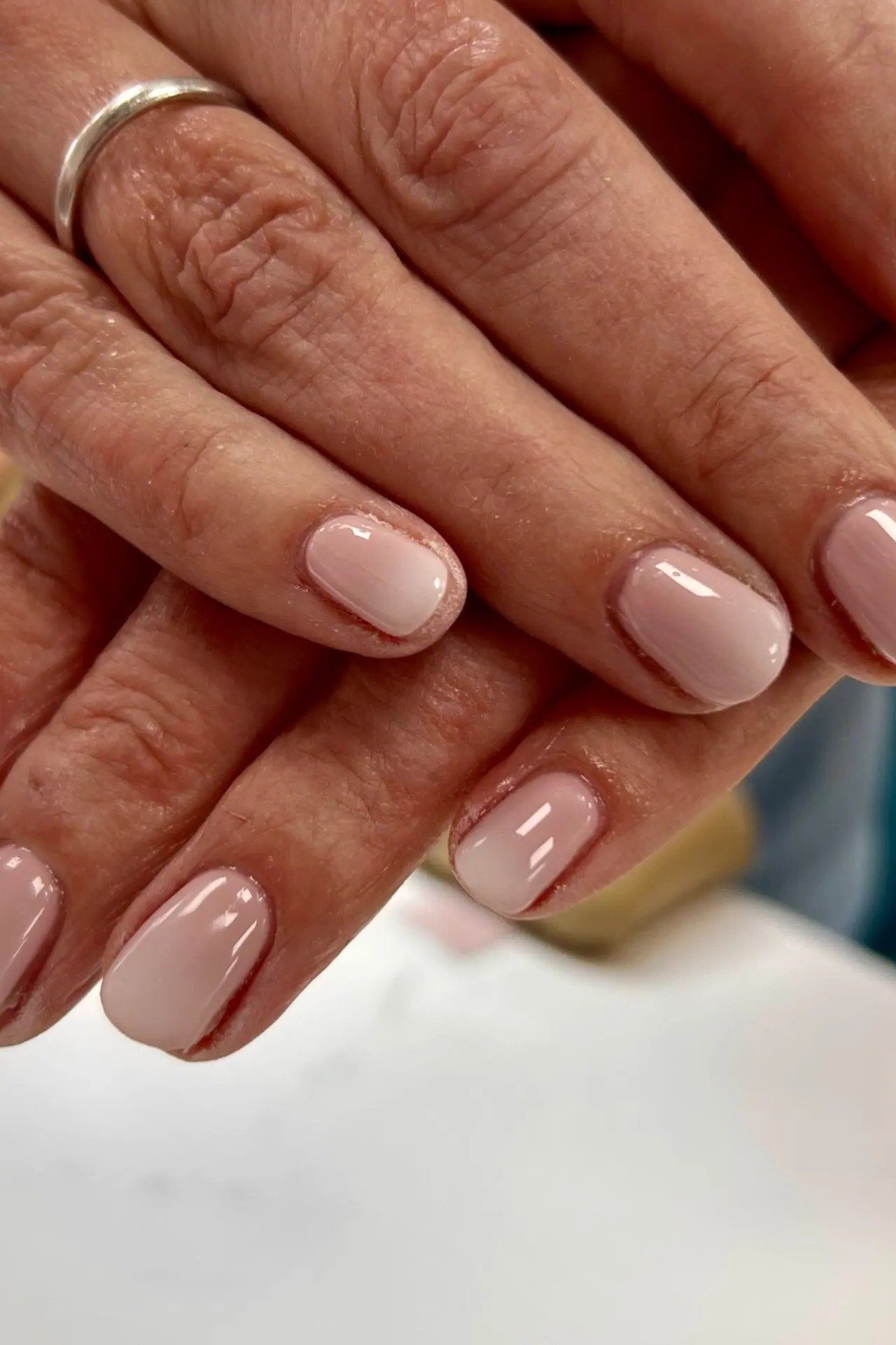 mauve pink short nails close-up