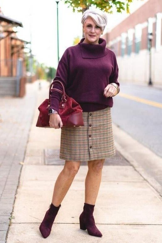 Plum turtleneck sweater with plaid mini skirt fall outfit idea for women over 60