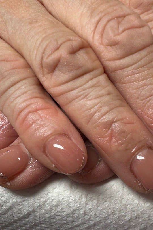 Best nails for women over 50: warm taupe