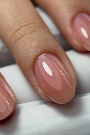Glossy Jelly Nude Pink Closeup - elegant nude nail design for women over 60