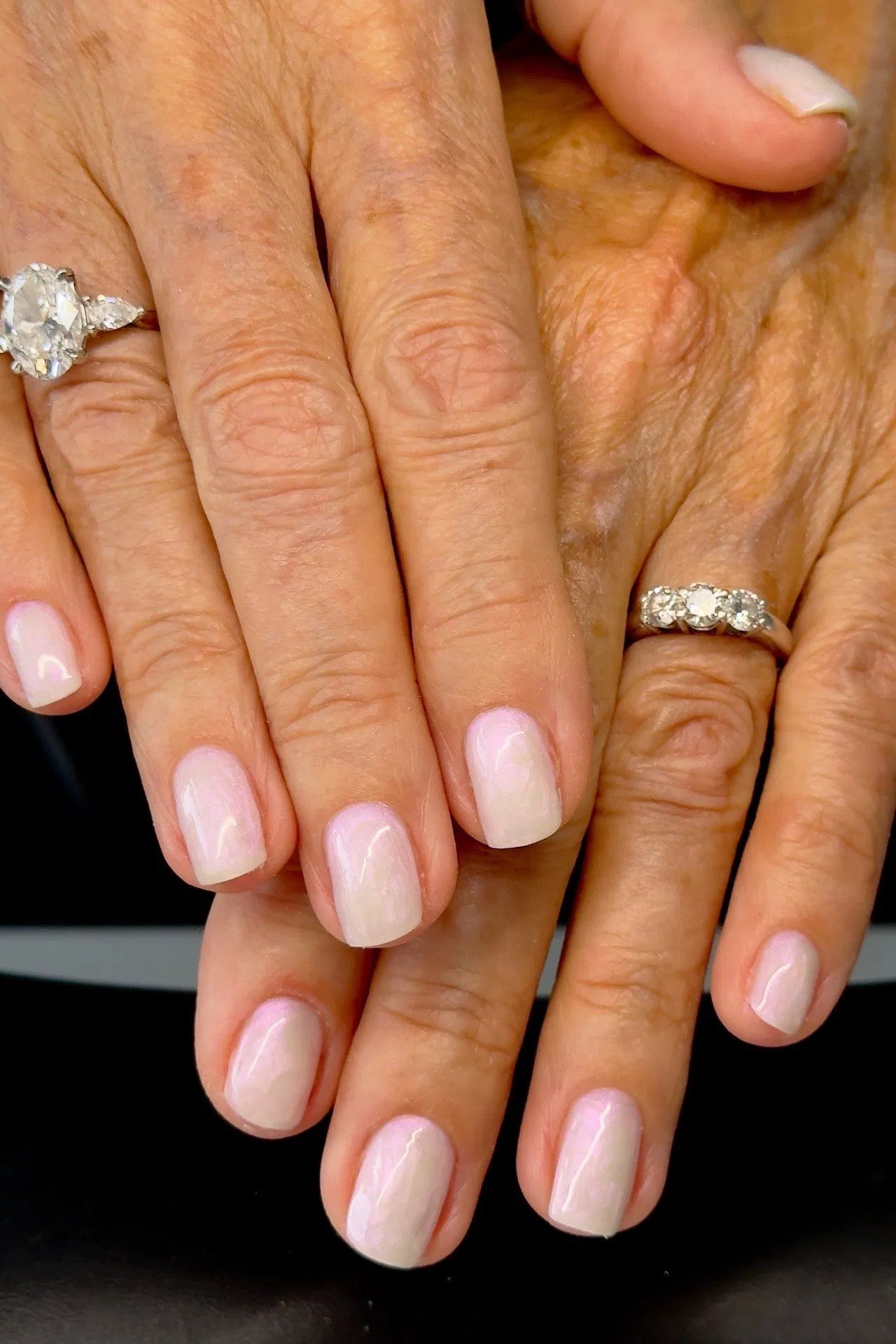 Soft baby pink gel nails for older women