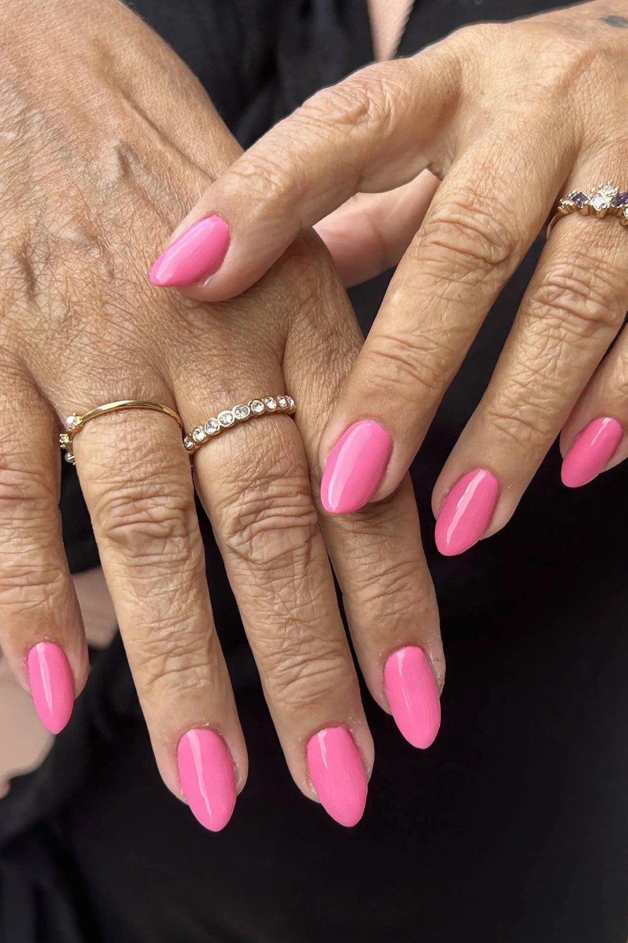 Hot Pink Almond Gel Nails - short gel nail idea for women over 50