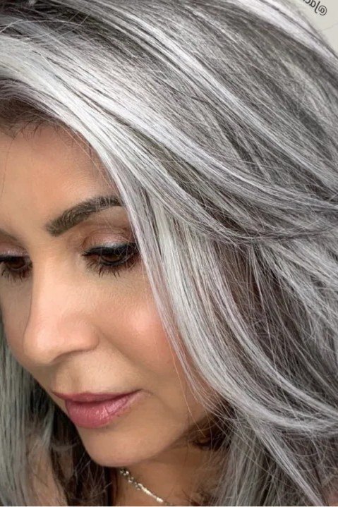 Silver layered cut with sweeping side fringe for women over 40