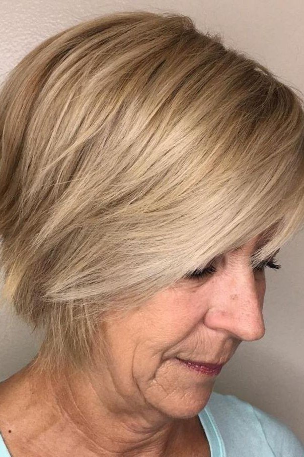 Silver grey pixie haircut for women over 70, side view