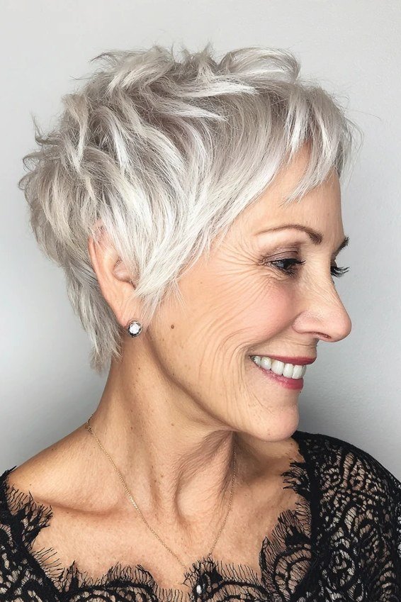 Textured white pixie haircut for women over 70, side view