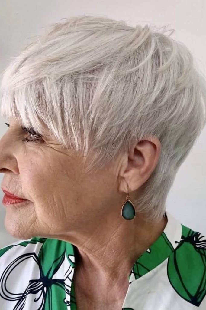 White pixie with forward-swept top - trendy short haircut for older women with fine hair