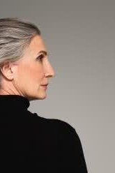 sleek straight silver bob haircut, side view