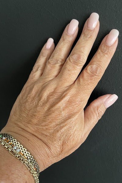 Warm beige short squoval neat - flattering nail design for older women