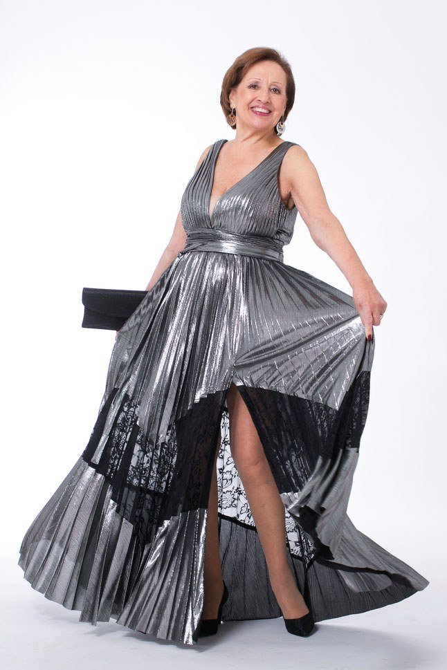 metallic silver pleated gown with thigh-high slit