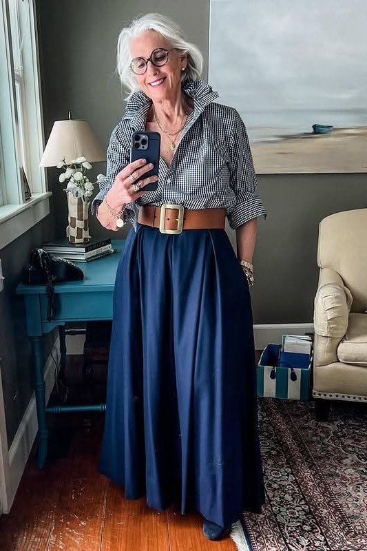 chambray shirt with navy maxi skirt and tan belt, casual classy outfit for women over 50
