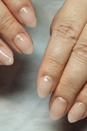 Best nails for women over 50: glossy nude glow
