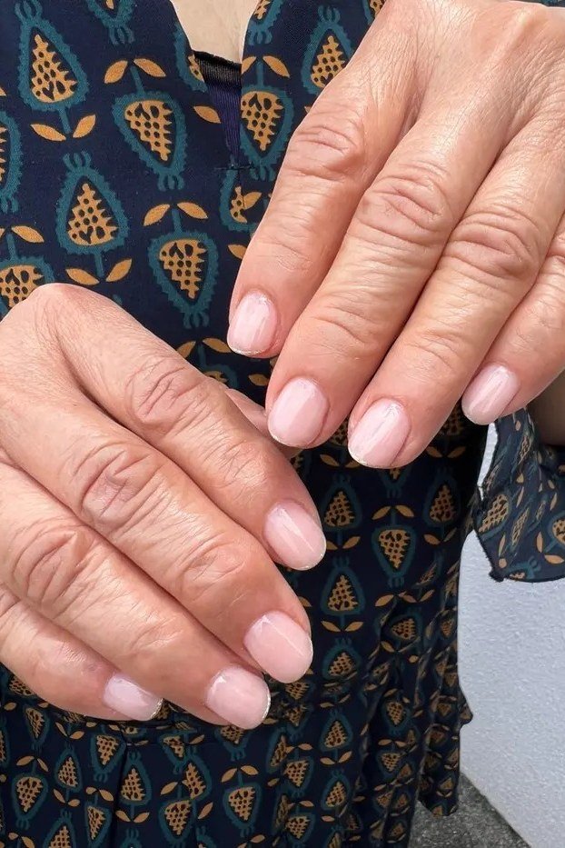 warm milky pink oval gel nails, peach pink nail color for older women