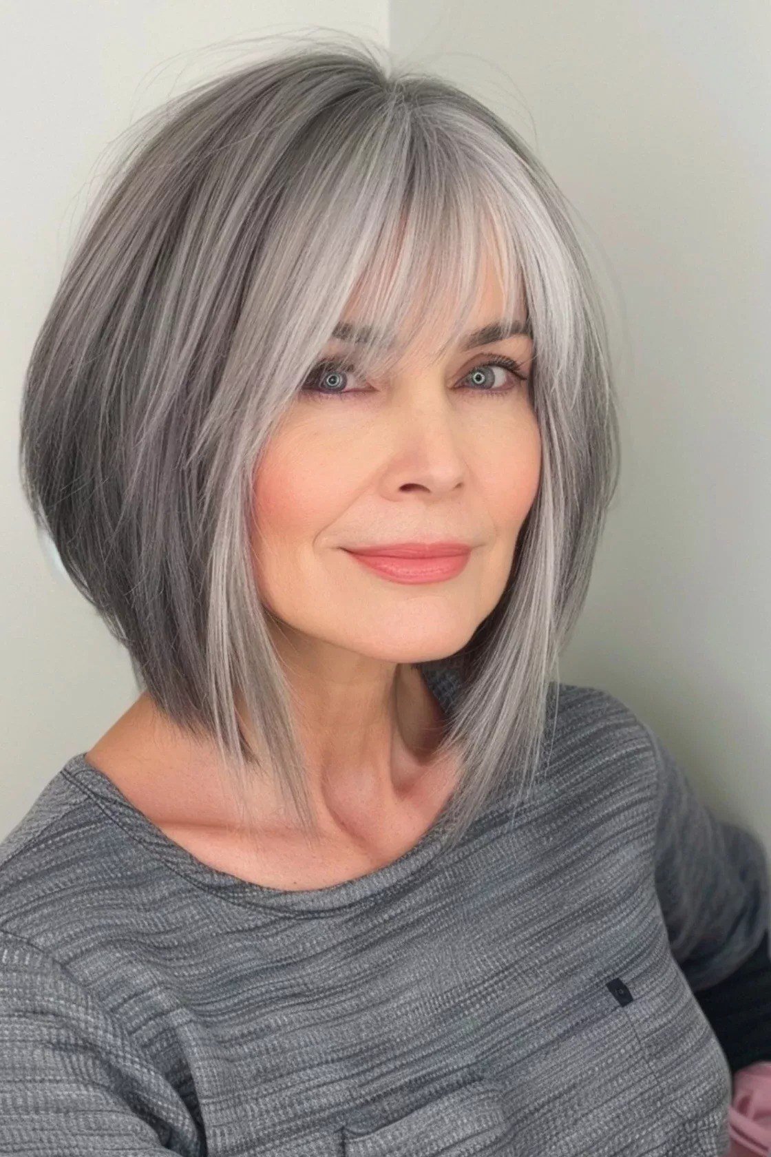 Silver Layered Lob with Airy Bangs - medium hairstyle for women over 60